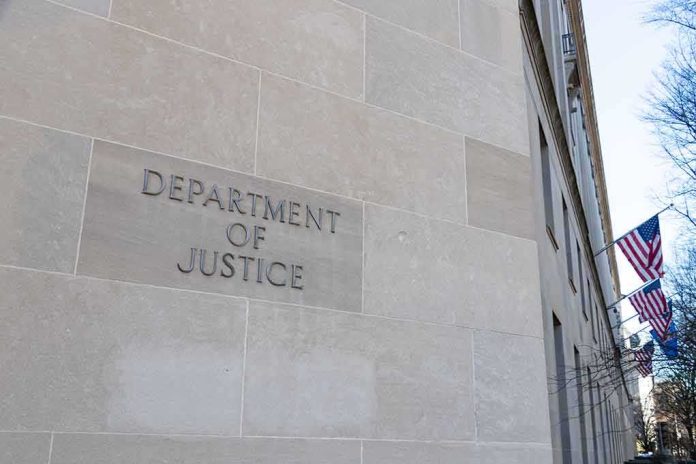 shutterstock_1605140956-1 Department of Justice building exterior with American flags