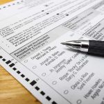 The Radical Movement Quietly Reshaping The Democratic Party Ballot paper with pen on wooden surface