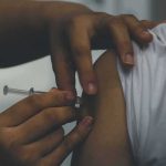 Banned Peptide Injections Become Latest Body-Optimization Craze person receiving an injection in the upper arm