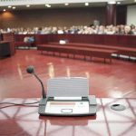 Oprah Guest Wants SAME ‘Passion’ for Black Mothers Who Kill Conference microphone on a podium in a courtroom