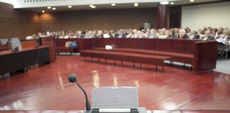 Oprah Guest Wants SAME ‘Passion’ for Black Mothers Who Kill Conference microphone on a podium in a courtroom