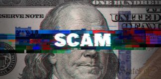 $25 Payment Caught on Undercover Video Draws DOJ Attention Close-up of a U.S. hundred-dollar bill with glitch effect and the word scam