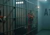Whistleblower Photos: ICE Detainees Extreme Overcrowding, Overflowing Toilets prison cell with inmates in orange jumpsuits behind bars
