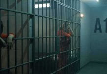 Whistleblower Photos: ICE Detainees Extreme Overcrowding, Overflowing Toilets prison cell with inmates in orange jumpsuits behind bars
