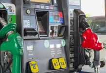 Diesel Prices Enter UNCHARTED Territory Gas pump with green diesel and red gasoline nozzles