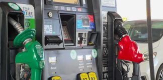 Diesel Prices Enter UNCHARTED Territory Gas pump with green diesel and red gasoline nozzles