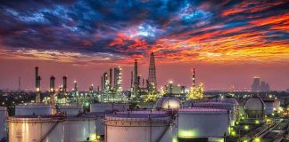 108% Capacity and India Still Can’t Relax on Diesel Oil refinery with storage tanks at sunset