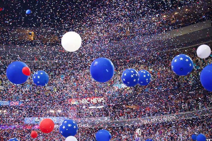 shutterstock_490440913 Blue and white balloons with confetti falling over a crowded indoor arena