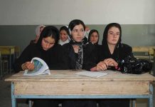 Tuition Trap: System Won, Students Paid Sihem Habchi and other women seated at a classroom desk