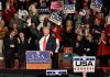 Trump Booed at Presidents Cup? WATCH the Tape Donald Trump addresses a rally crowd at a podium, raising his fist