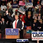 Trump Booed at Presidents Cup? WATCH the Tape Donald Trump addresses a rally crowd at a podium, raising his fist