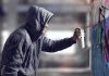 Macklemore Painted in Gaza After Tour Removal Person in hoodie spray painting a wall