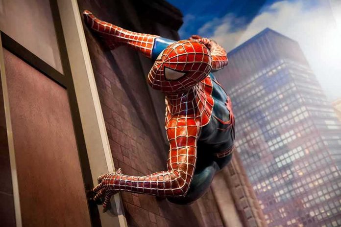 shutterstock_618809906 Spider-Man climbing a city building