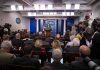 Team Trump Drops BRUTAL Receipt on CNN Press secretary at podium addressing reporters in briefing room
