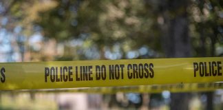 Ted Bundy’s NEW Victim Revealed After 52 Years yellow police tape cordoning off an outdoor area