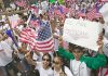 Trump ERUPTS Over Latino Poll Numbers Josh Boyce and crowd at a demonstration waving American flags