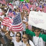 Trump ERUPTS Over Latino Poll Numbers Josh Boyce and crowd at a demonstration waving American flags