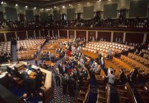 Pipeline Enemy Suddenly BEGS for More Gas Legislative chamber with members gathering on the floor
