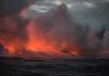 Ocean SWALLOWS California’s Coast Highway Volcanic steam plume over dark ocean at dusk