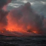 Ocean SWALLOWS California’s Coast Highway Volcanic steam plume over dark ocean at dusk