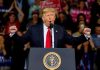 Trump Says He’s Saving MARRIAGES Donald Trump speaking at a rally podium with arms raised