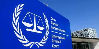 Rubio Hits International Criminal Court With SANCTIONS International Criminal Court sign with scales emblem outside modern building