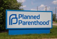 128 Lawmakers Target Planned Parenthood’s Federal Cash Planned Parenthood sign outdoors