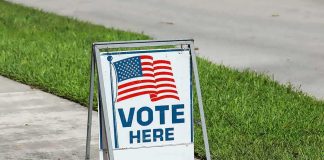 Chicago’s Tax-Hiking Mayor INVADES Florida Race A-frame sidewalk sign with American flag and vote message