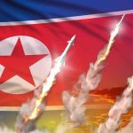 Report Warns Of North Korea’s Latest NUKE Program North Korean flag with missiles launching and smoke trails