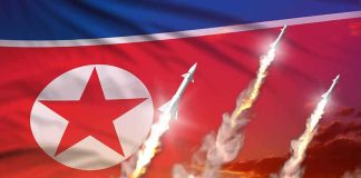 Report Warns Of North Korea’s Latest NUKE Program North Korean flag with missiles launching and smoke trails