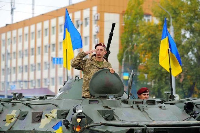 Soldiers on armored vehicle with Ukrainian flags