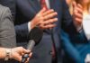 Scott Jennings’ Viral Clip of Liberal ‘HANDS’ Reporter holding microphone toward speaker in suit
