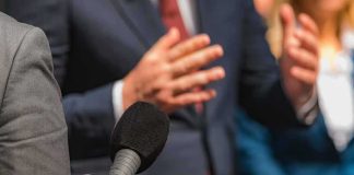 Scott Jennings’ Viral Clip of Liberal ‘HANDS’ Reporter holding microphone toward speaker in suit