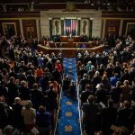 $5,000 Checks Promised If Republicans WIN Legislative chamber audience stands and applauds