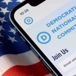 Democrat’s Criminal Past ROARS Back Smartphone showing a political committee webpage on an American flag