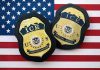 Family Sues Over DEADLY ICE Shooting ICE badges on an American flag background