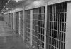 Two Lethal Doses FAILED to Kill Her Row of prison cells with barred doors
