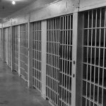 Two Lethal Doses FAILED to Kill Her Row of prison cells with barred doors