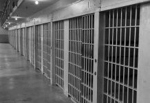 Two Lethal Doses FAILED to Kill Her Row of prison cells with barred doors