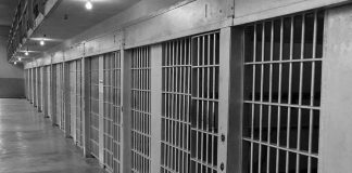Two Lethal Doses FAILED to Kill Her Row of prison cells with barred doors