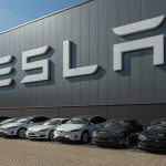 Watch Tesla’s New Roadster Go AIRBORNE Tesla cars parked outside a large Tesla building