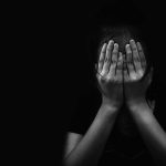 Child Predator Sting Takes a DISTURBING Turn person covering face with both hands in darkness
