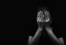 Child Predator Sting Takes a DISTURBING Turn person covering face with both hands in darkness