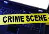 6+ Senators Targeted With Mystery White POWDER Laptop keyboard with yellow crime scene tape across it