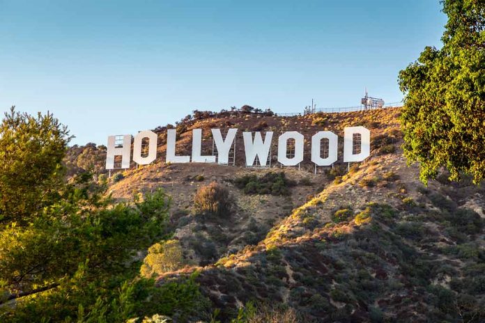 114467512 featured image Hollywood sign on a hill with trees.
