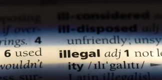 Highlighted word illegal with definition in dictionary.