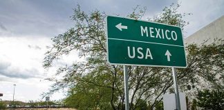 Directional sign for Mexico and USA