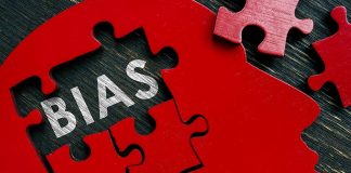 Red brain puzzle with the word "bias" inside.