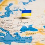Map with a Ukrainian flag pin on Ukraine