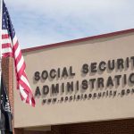 Social Security Administration building with American flag.